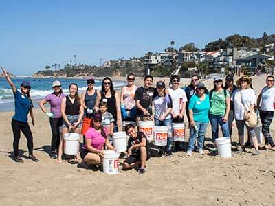 Volunteers at beach clean-up at Aliso Creek