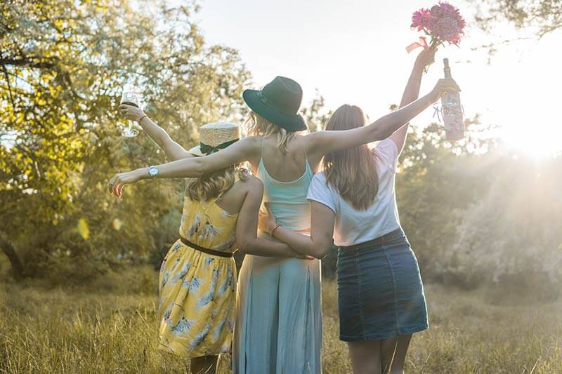 Three women having fun outdoors