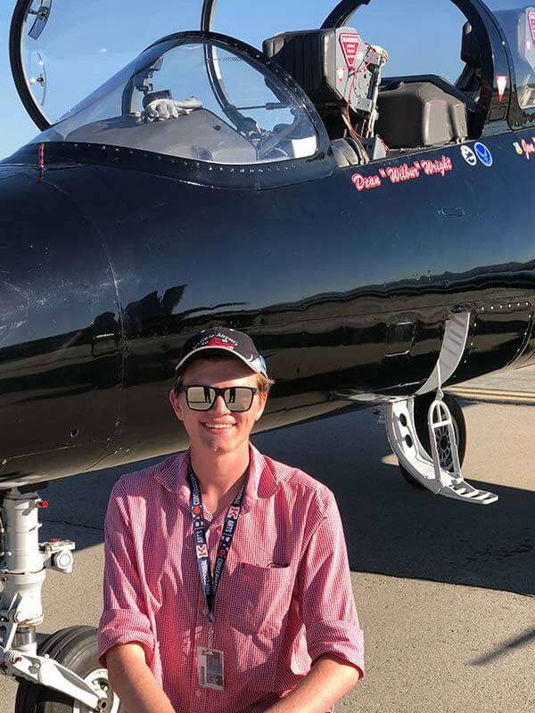Matt-Airshow Pacific Airshow guest narrator Matt in front of an airplane