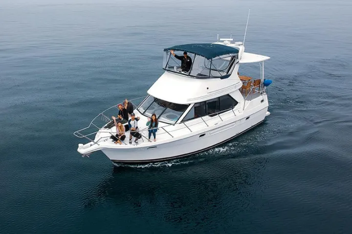 Guests on the bow of Motor Yacht ORCA