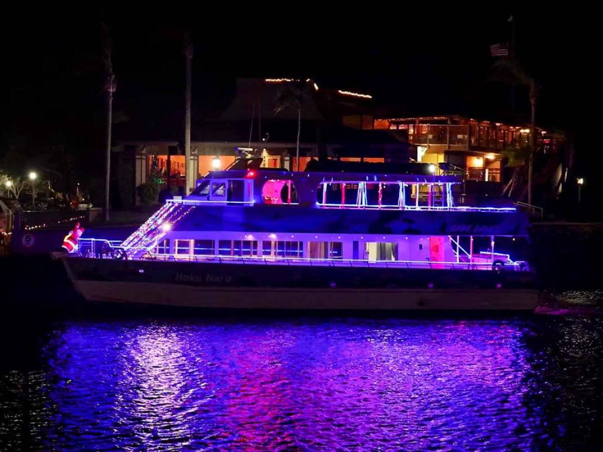 Catamaran Hoku Nai'a celebrates the holidays in the Dana Point Harbor Boat Parade of Lights. Perfect boat for a holiday party!