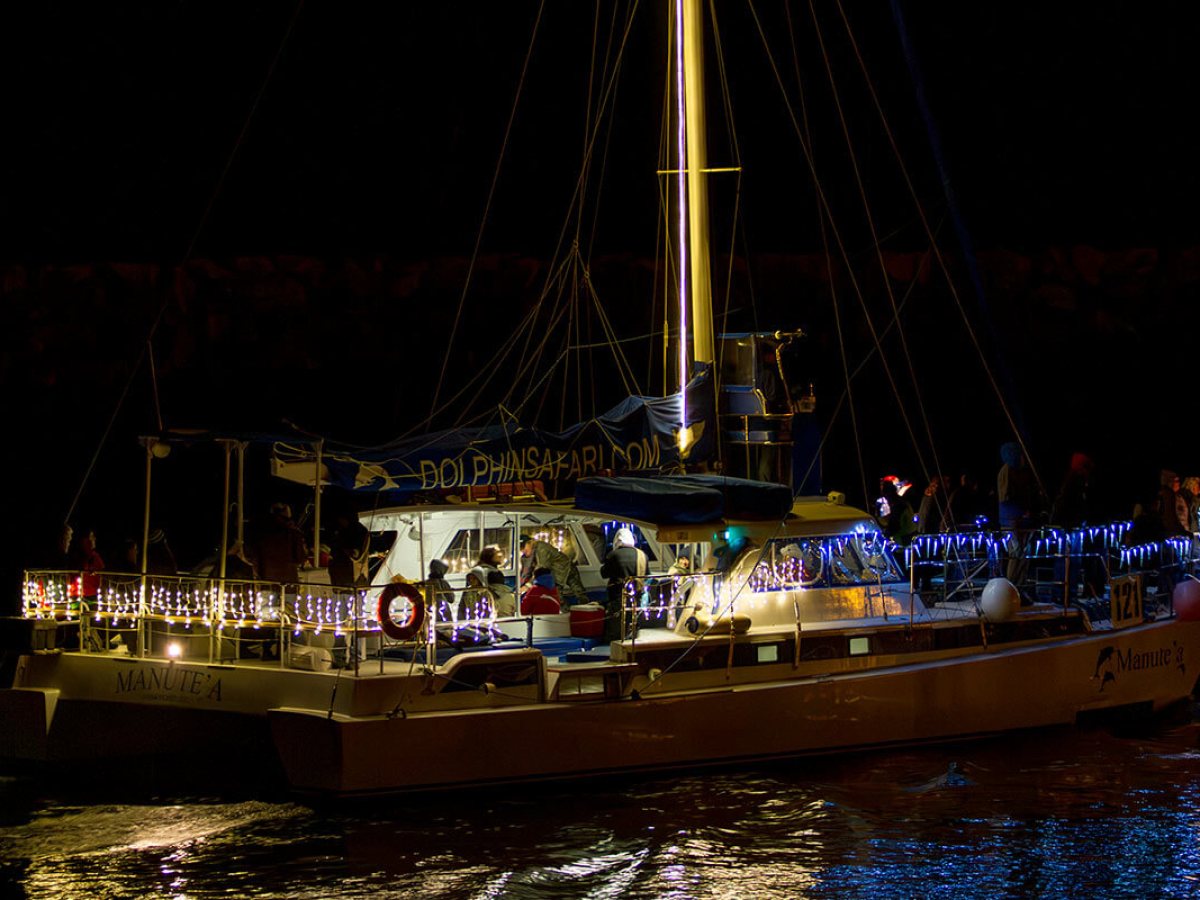 Catamaran Manute'a celebrates the holidays in the Dana Point Harbor Boat Parade of Lights
