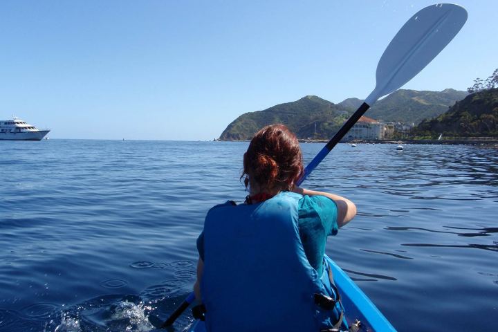 Woman Paddles Kayak toward Catalina Island © Eric Broder Van Dyke | Dreamstime