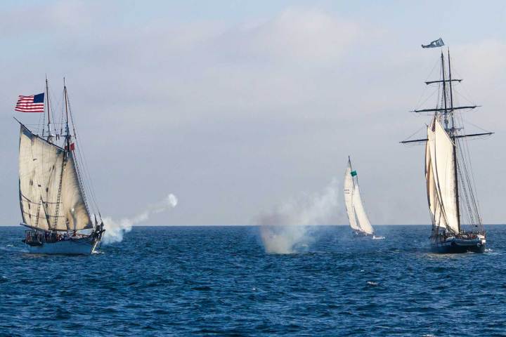 Tall Ships participate in mock cannon battle during Dana Point Tall Ships Festival