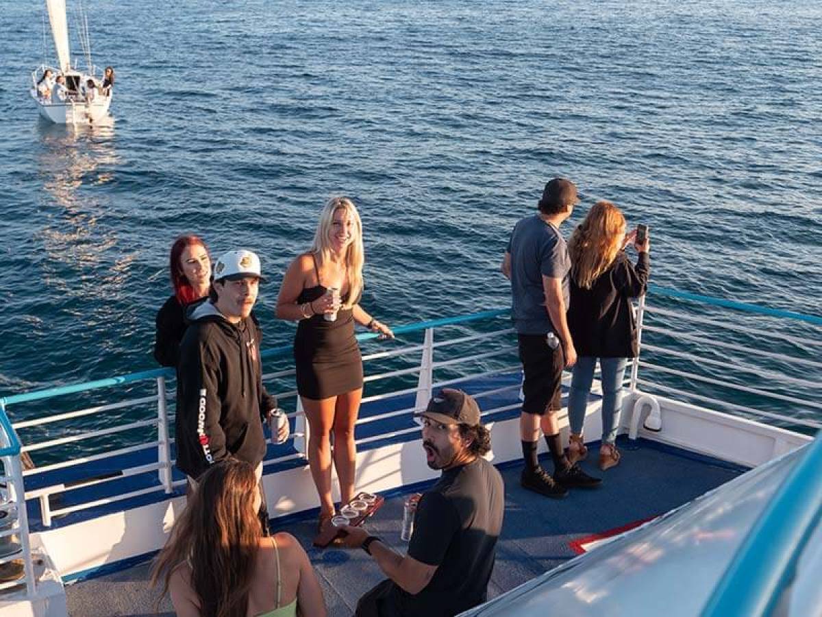 Guests enjoy the beautiful scenery during Brews Cruise beer tasting experience in Dana Point