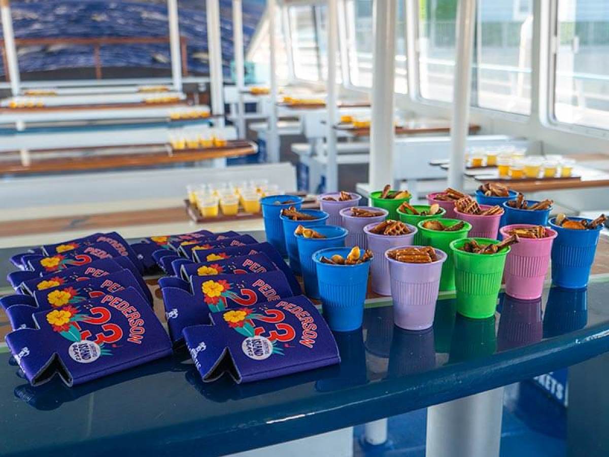 Snacks on a surfboard table during Brews Cruise in Dana Point