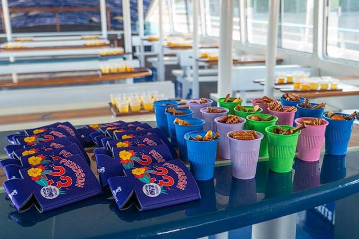 Snacks on a surfboard table during Brews Cruise in Dana Point