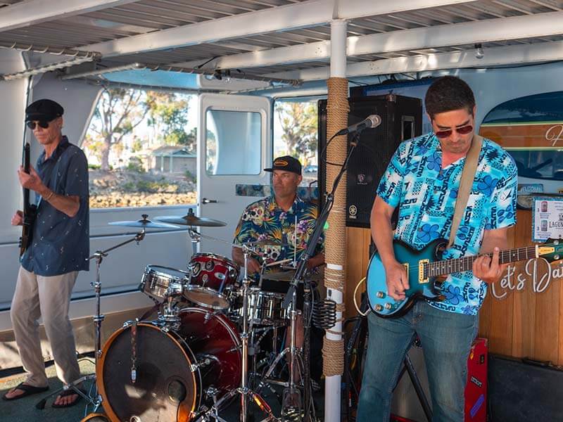 Entropy-1679633_800x600 Three band members of Entropy play music on the boat during Brews Cruise beer tasting experience in Dana Point