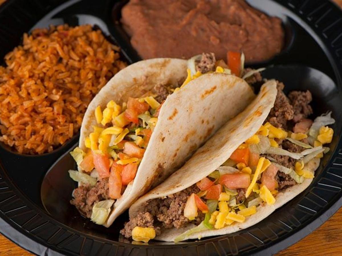 Soft tacos, refried beans, and rice