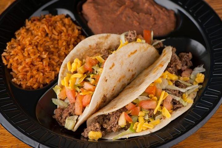 Soft tacos, refried beans, and rice