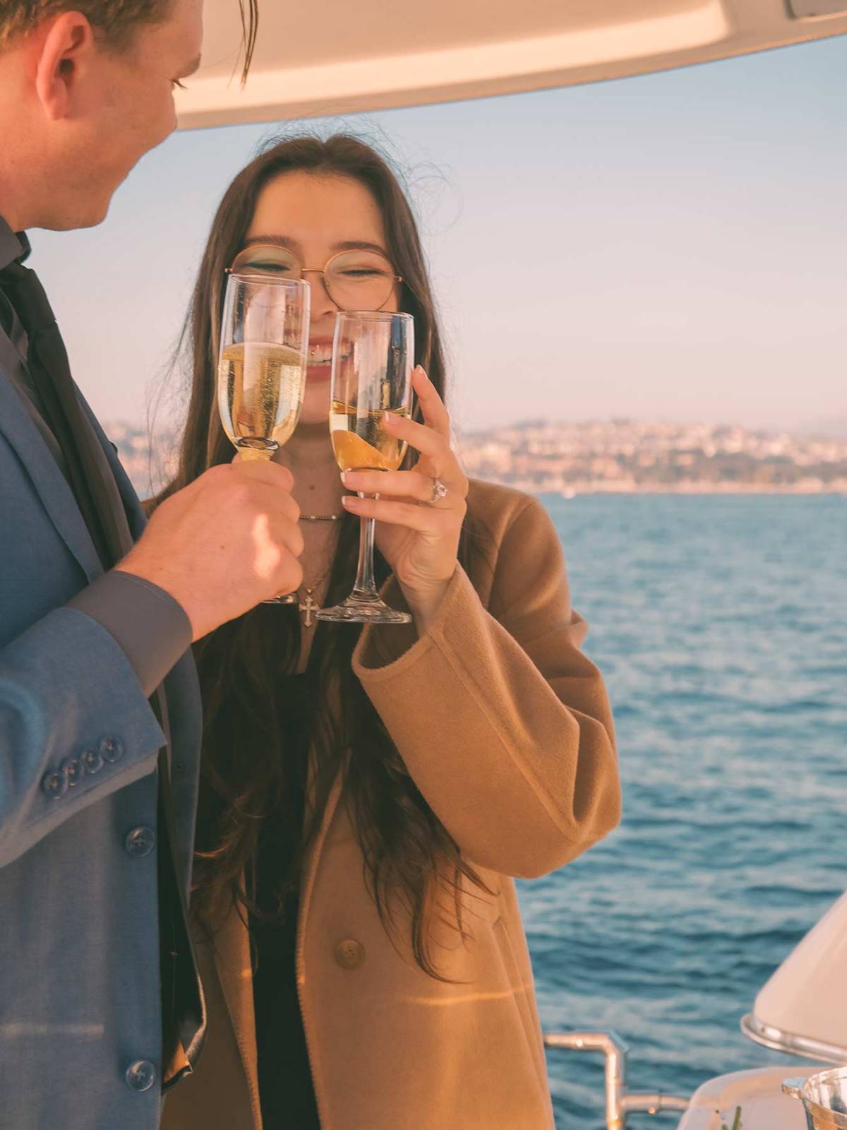 Marriage Proposal Champagne toast during marriage proposal at sea on a yacht