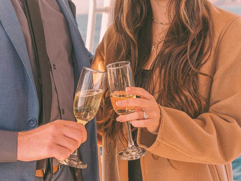 Marriage Proposal Champagne toast during marriage proposal at sea on a yacht off the coast of Dana Point, California