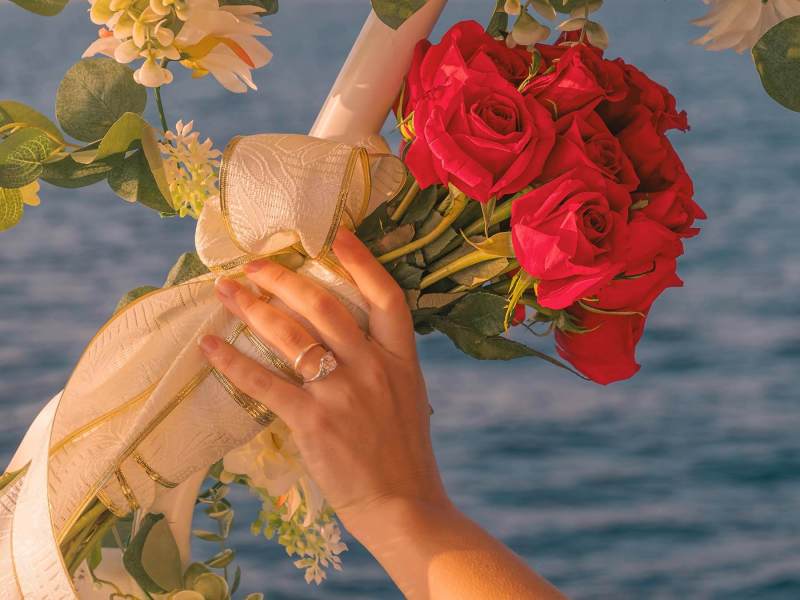 Marriage Proposal A bouquet of roses during marriage proposal at sea on a yacht off the coast of Dana Point, California