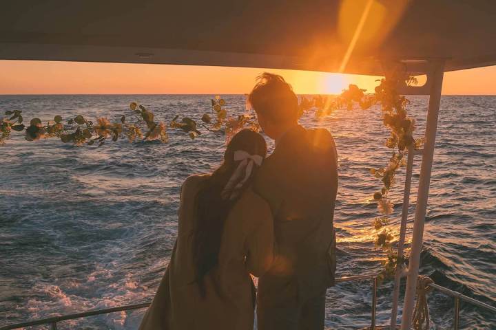 Marriage proposal during sunset on a yacht off the coast of Dana Point, California