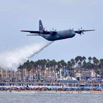 a large airplane flying high up in the air