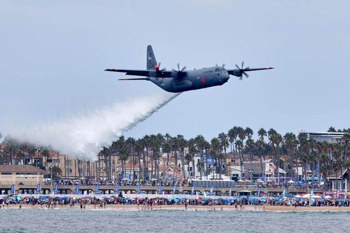 a large airplane flying high up in the air